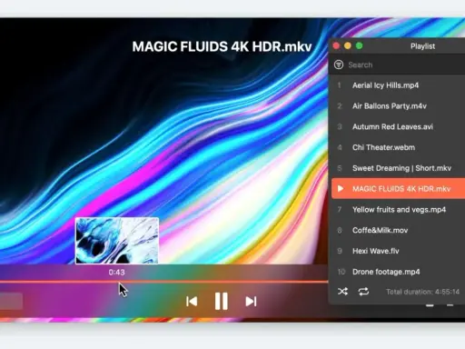 Odtwarzacz filmów z napisami wyświetla "MAGIC FLUIDS 4K HDR.mkv" na tle kolorowych fal. Widoczna jest lista odtwarzania.