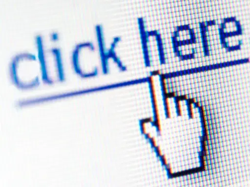 Kursor myszy nad tekstem "click here". Dowiedz się, jak usunąć hiperłącze, gdy już nie jest potrzebne.